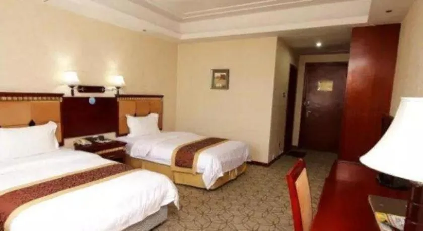 Bed in Shengshi Jinhua Hotel