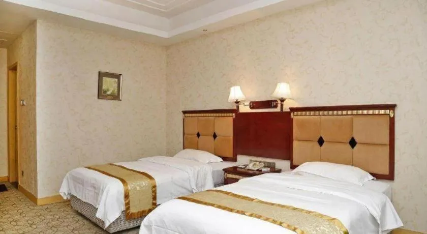 Bed in Shengshi Jinhua Hotel