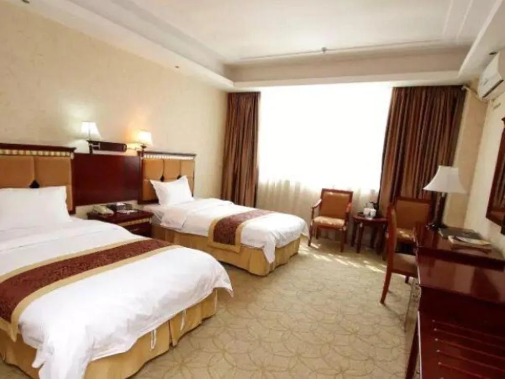 Bed in Shengshi Jinhua Hotel
