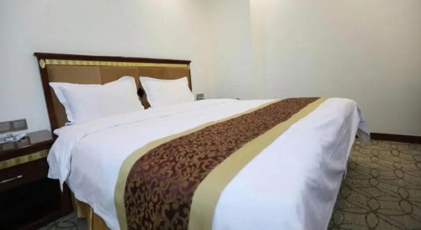 Bed in Shengshi Jinhua Hotel