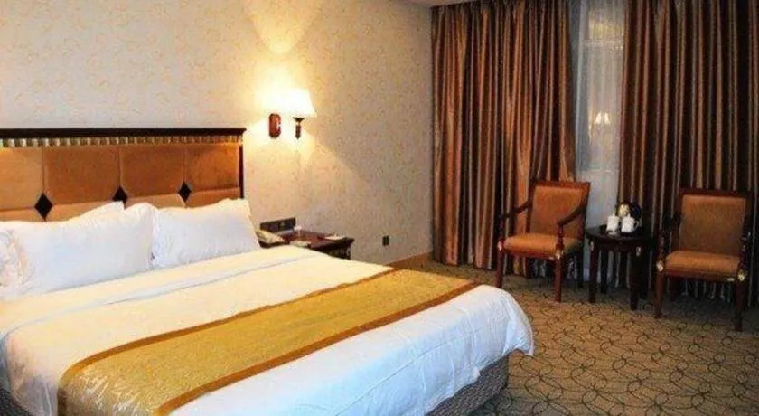 Bed in Shengshi Jinhua Hotel