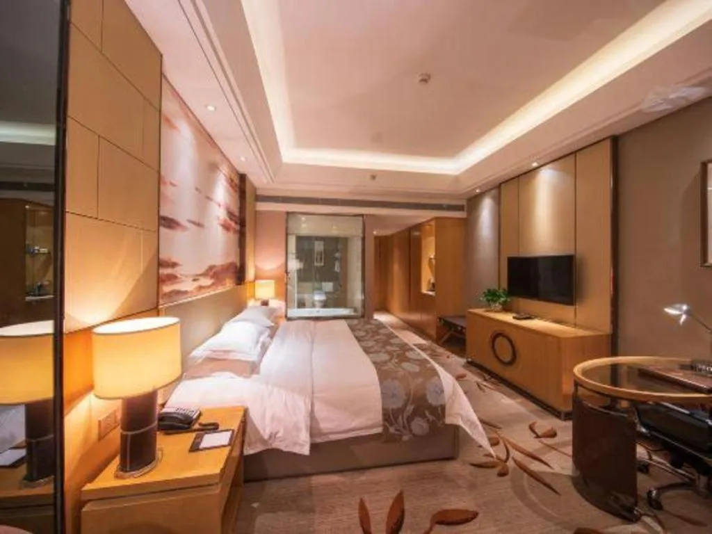 Bed in Zhengzhou Swan City International Hotel