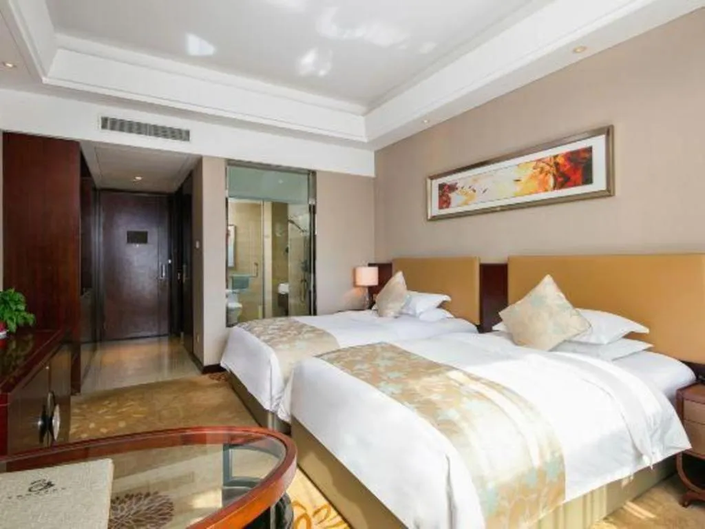 Bed in Zhengzhou Swan City International Hotel