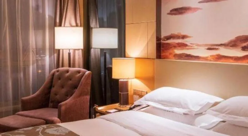 Bed in Zhengzhou Swan City International Hotel