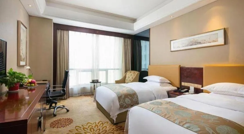 Bed in Zhengzhou Swan City International Hotel