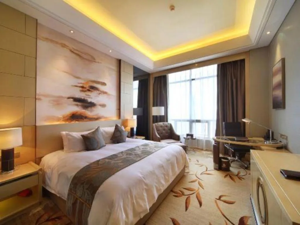 Bed in Zhengzhou Swan City International Hotel