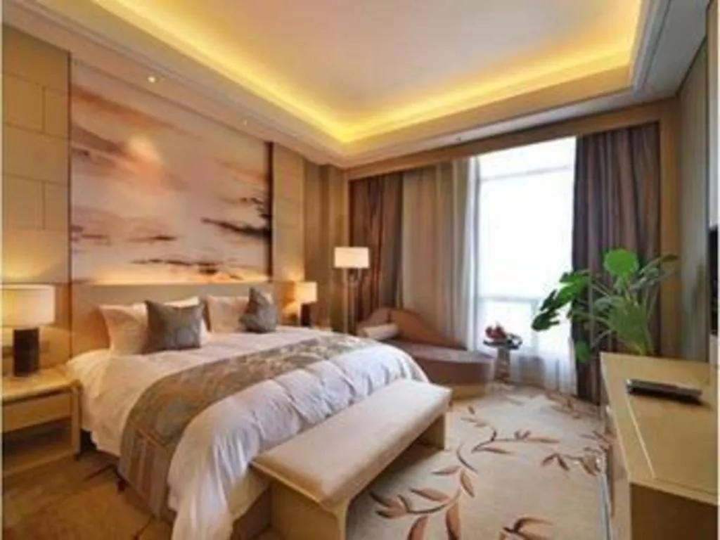 Bed in Zhengzhou Swan City International Hotel