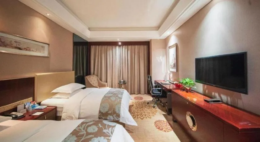 Bed in Zhengzhou Swan City International Hotel