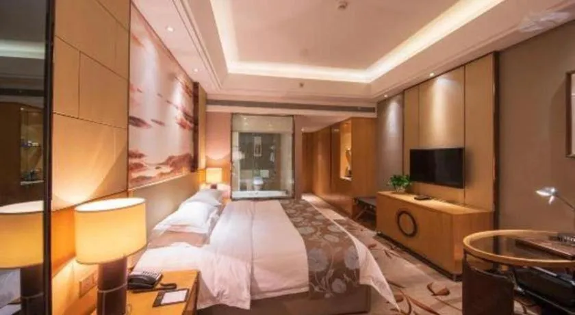 Bed in Zhengzhou Swan City International Hotel