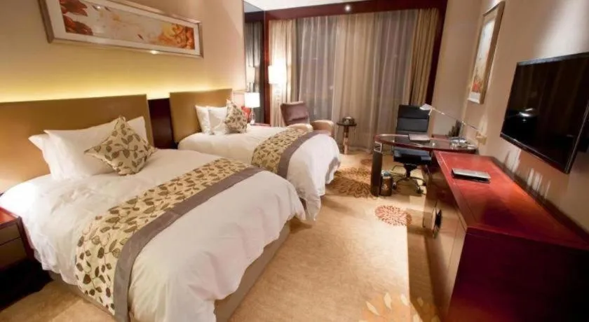 Bed in Zhengzhou Swan City International Hotel