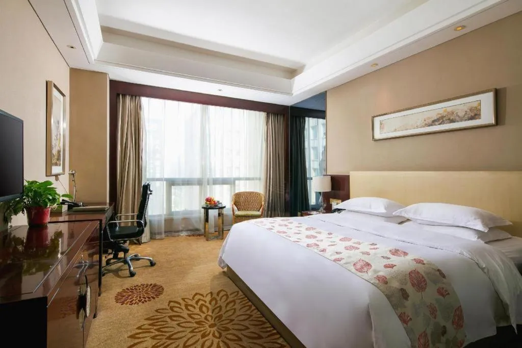 Bed in Zhengzhou Swan City International Hotel