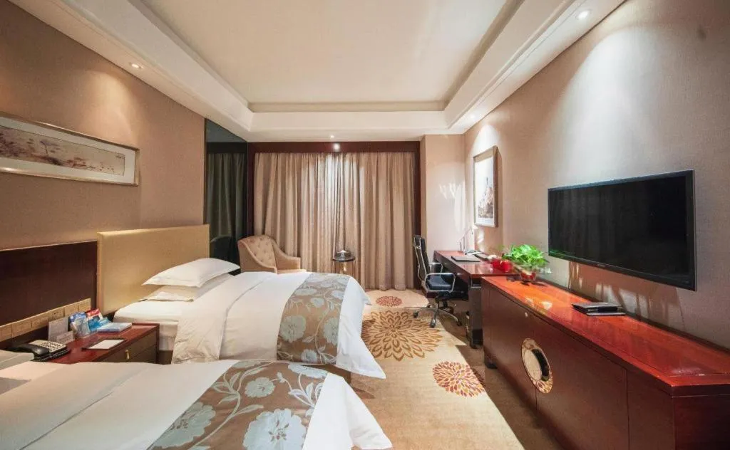 Bed in Zhengzhou Swan City International Hotel