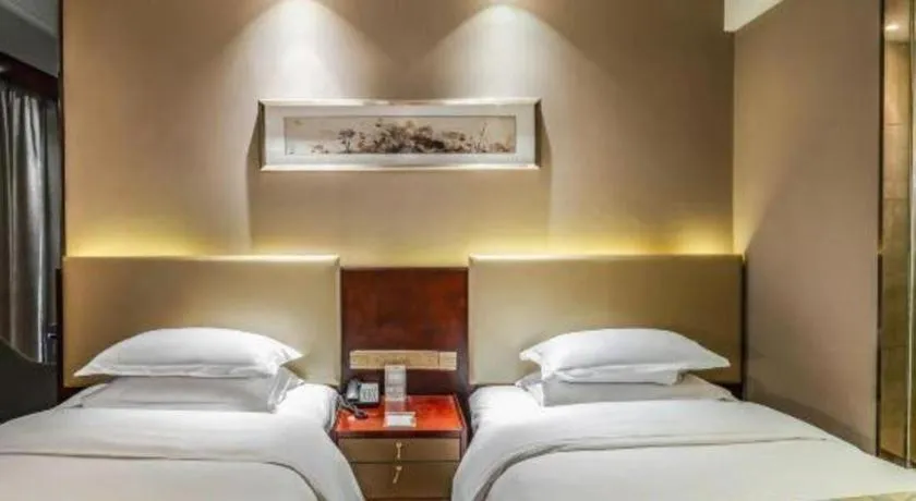 Bed in Zhengzhou Swan City International Hotel