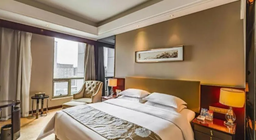 Bed in Zhengzhou Swan City International Hotel