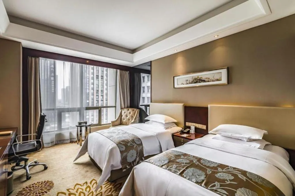 Bed in Zhengzhou Swan City International Hotel