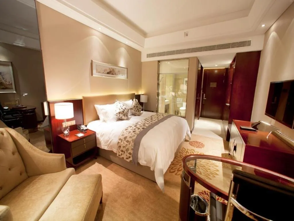 Bed in Zhengzhou Swan City International Hotel