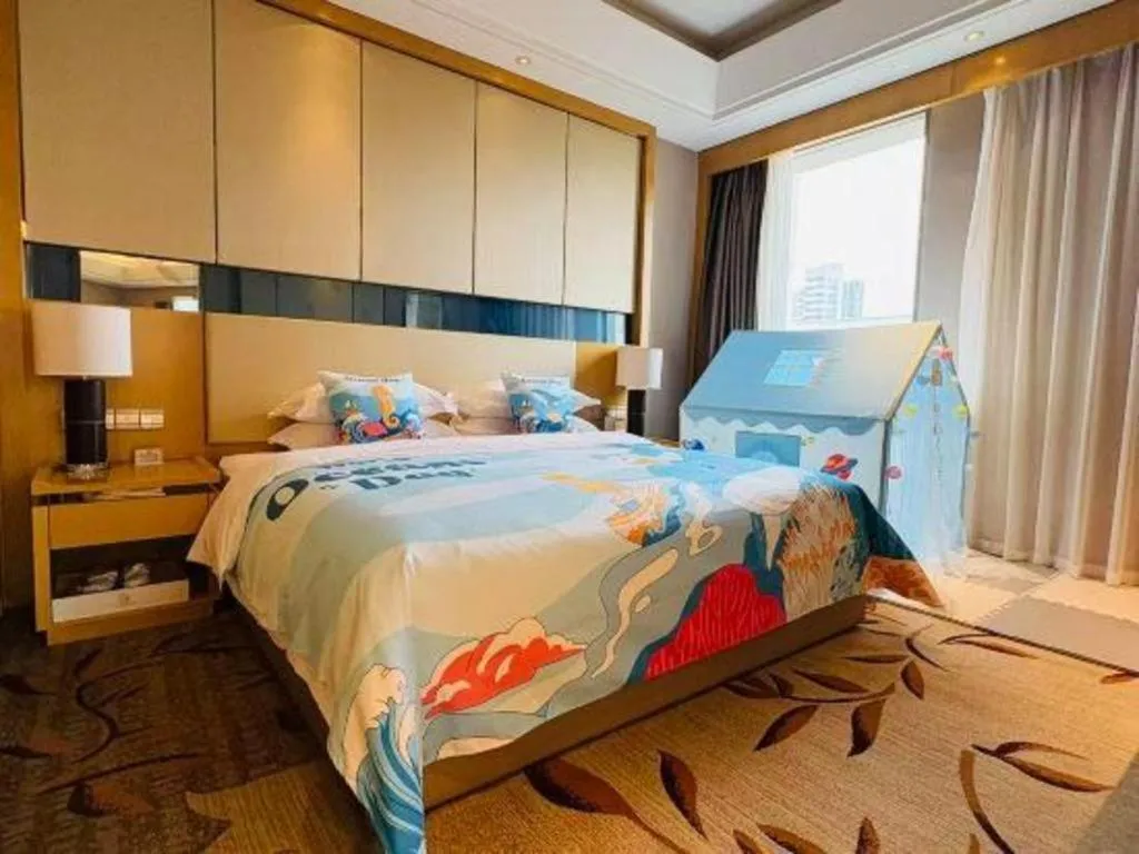 Bed in Zhengzhou Swan City International Hotel