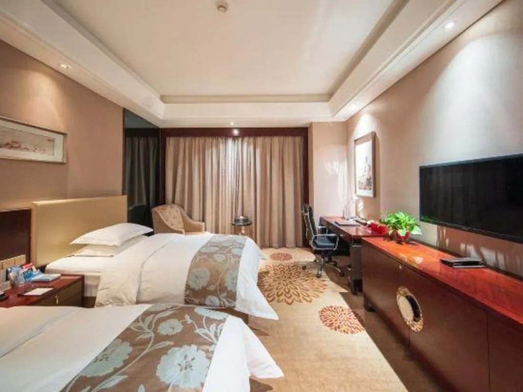 Bed in Zhengzhou Swan City International Hotel
