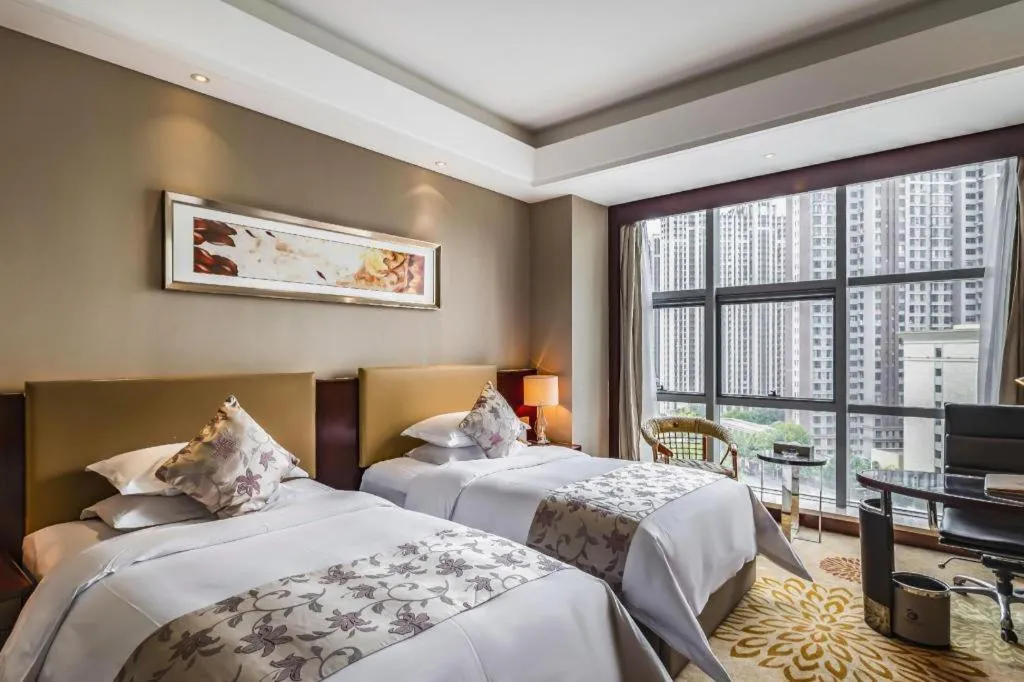 Bed in Zhengzhou Swan City International Hotel