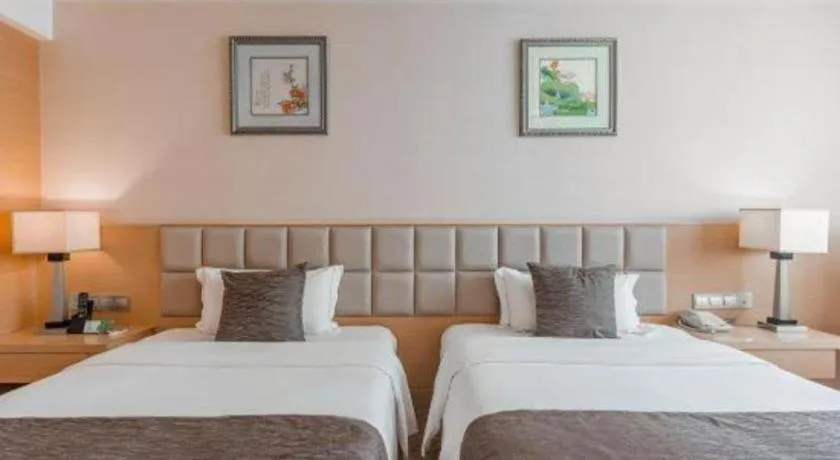 Bed in Chengdu Yinsheng International Hotel