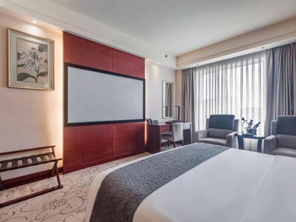 Bed in Chengdu Yinsheng International Hotel