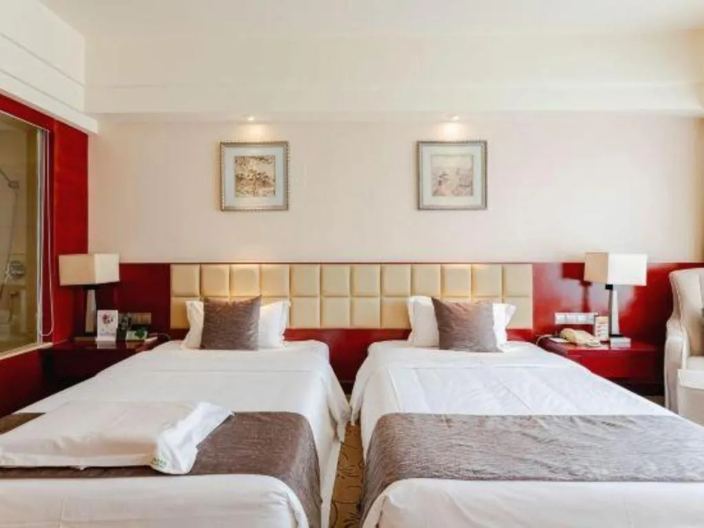 Bed in Chengdu Yinsheng International Hotel