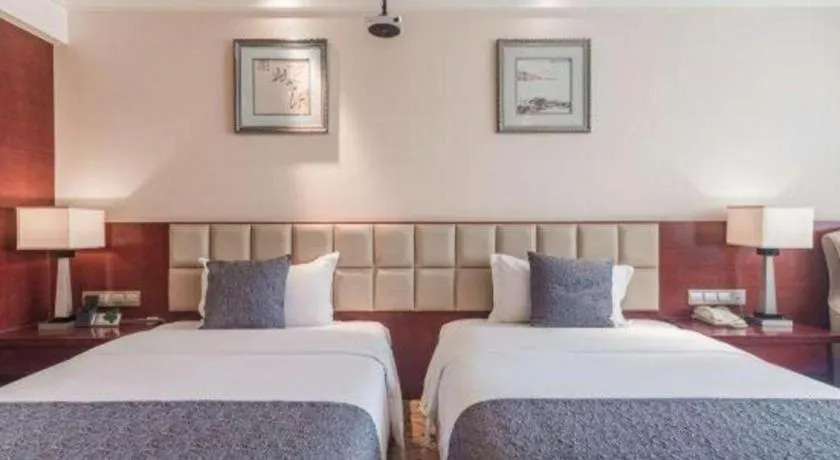 Bed in Chengdu Yinsheng International Hotel