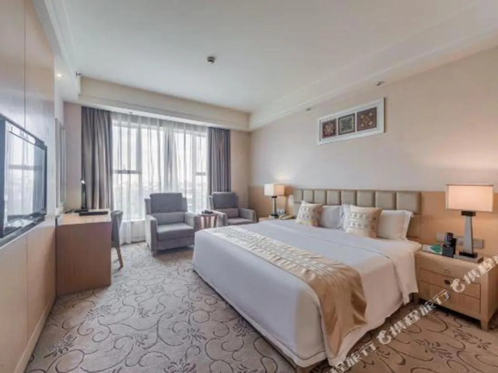 Bed in Chengdu Yinsheng International Hotel