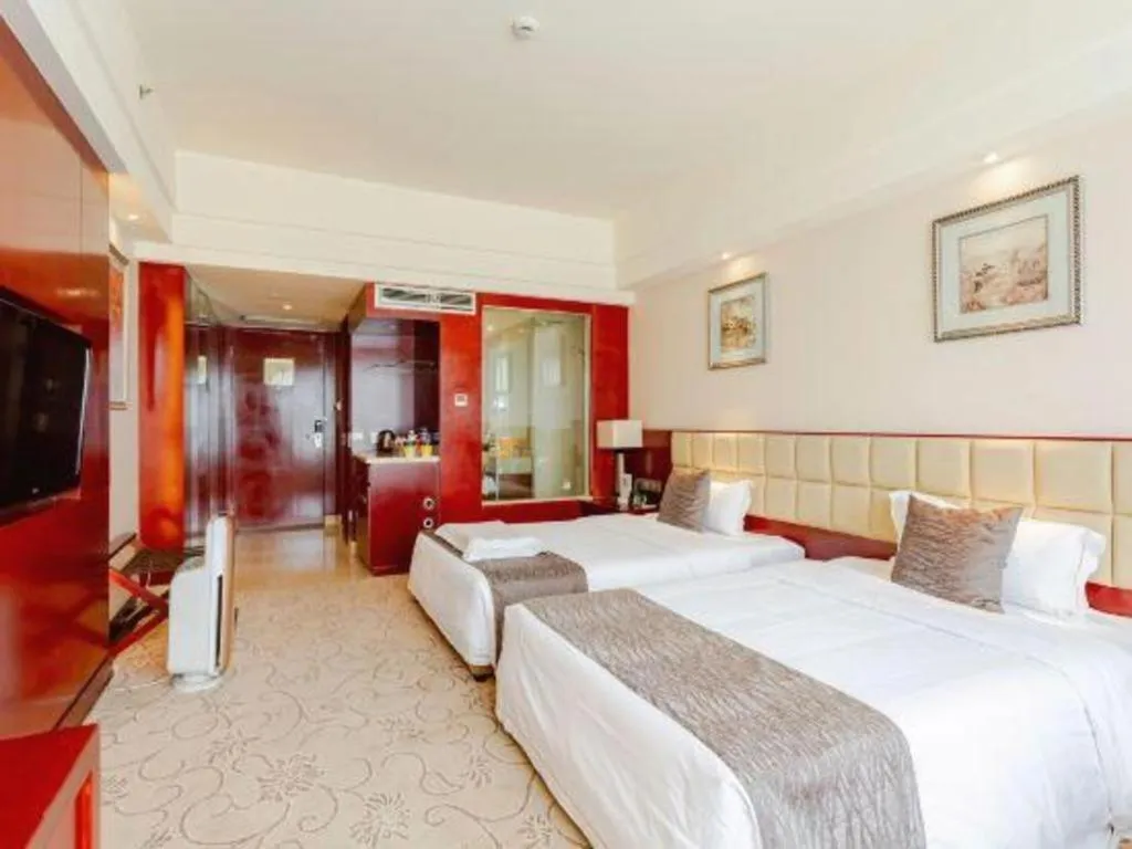 Bed in Chengdu Yinsheng International Hotel