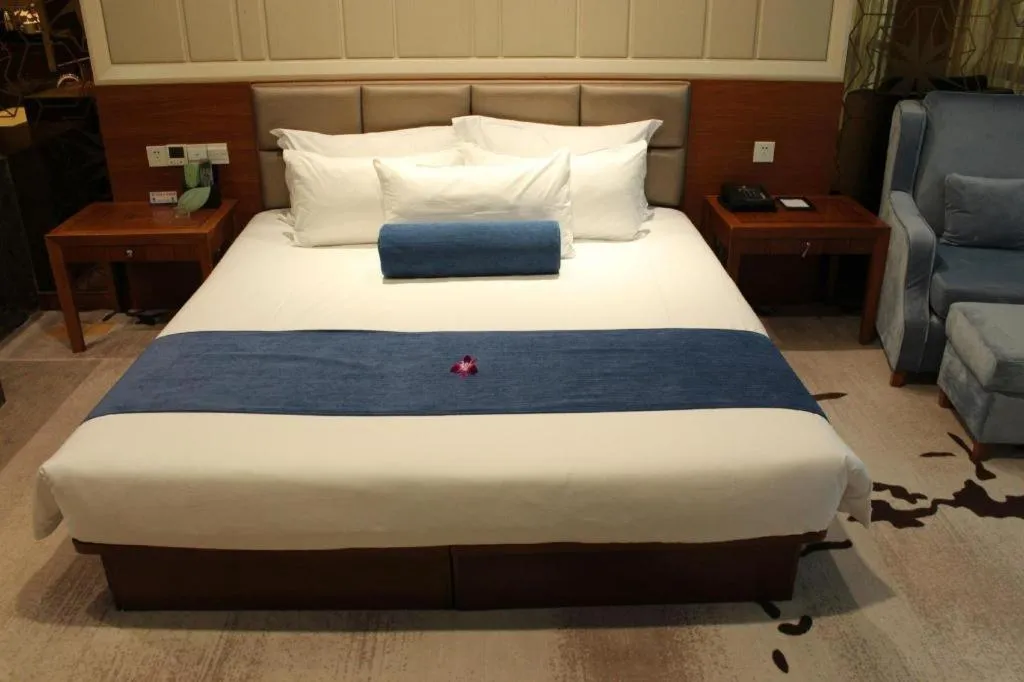 Bed in Ningbo East Shipu Hotel