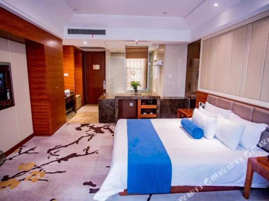 Bed in Ningbo East Shipu Hotel