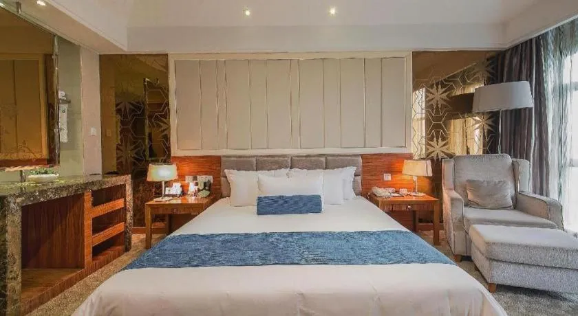 Bed in Ningbo East Shipu Hotel