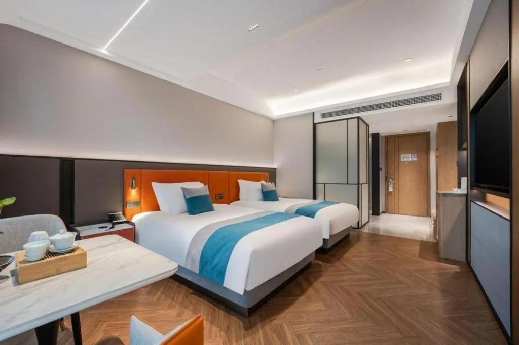 Bed in Ningbo East Shipu Hotel