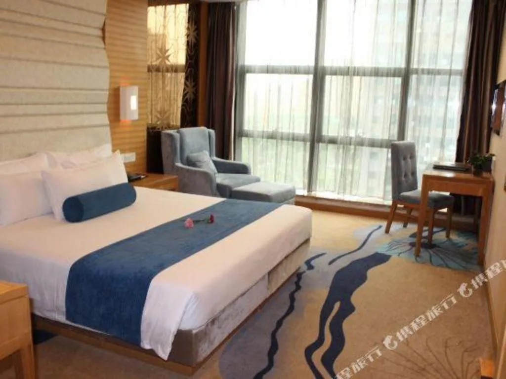 Bed in Ningbo East Shipu Hotel