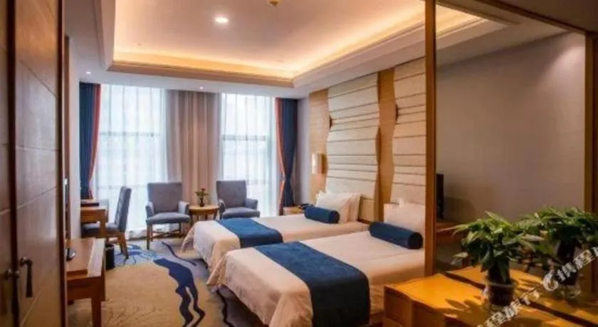 Bed in Ningbo East Shipu Hotel