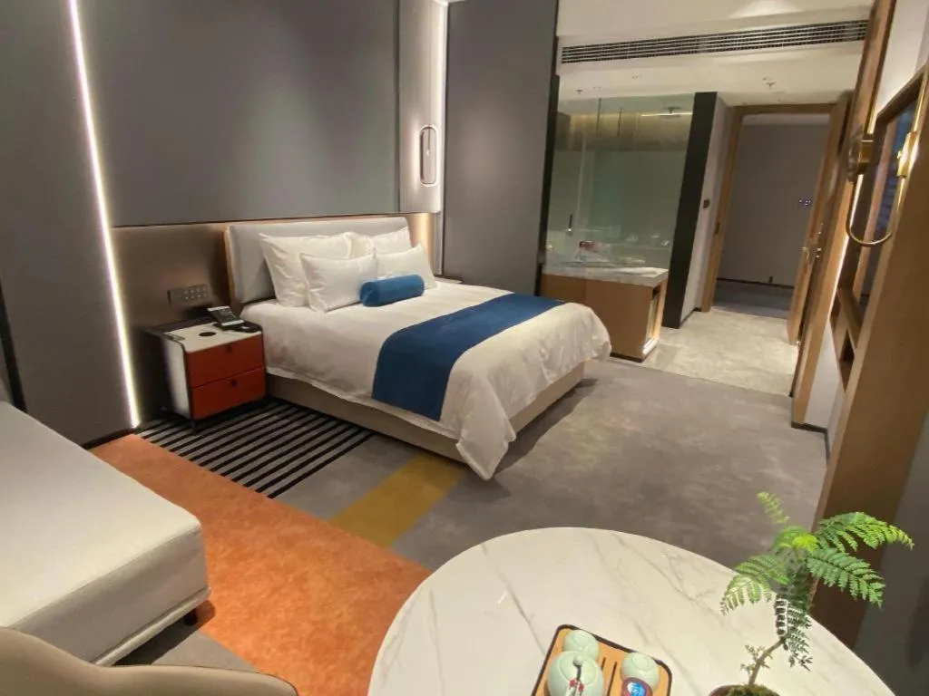 Bed in Ningbo East Shipu Hotel