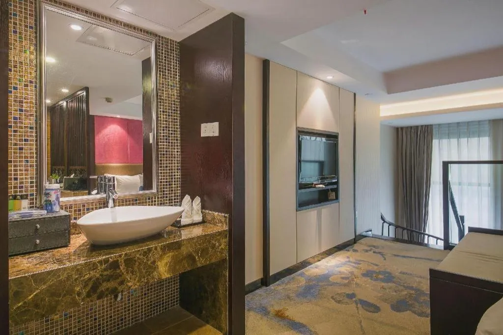 Bed in Ningbo East Shipu Hotel