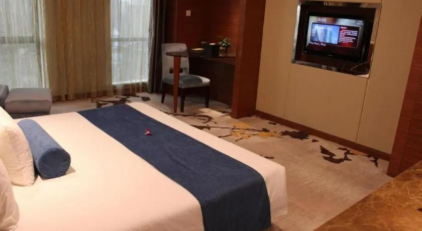 Bed in Ningbo East Shipu Hotel