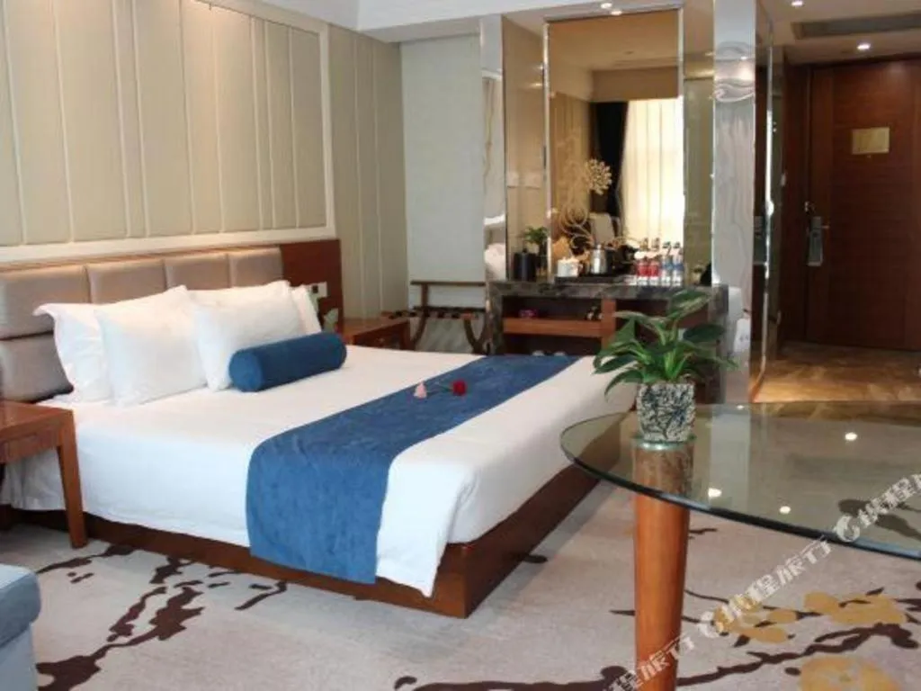 Bed in Ningbo East Shipu Hotel