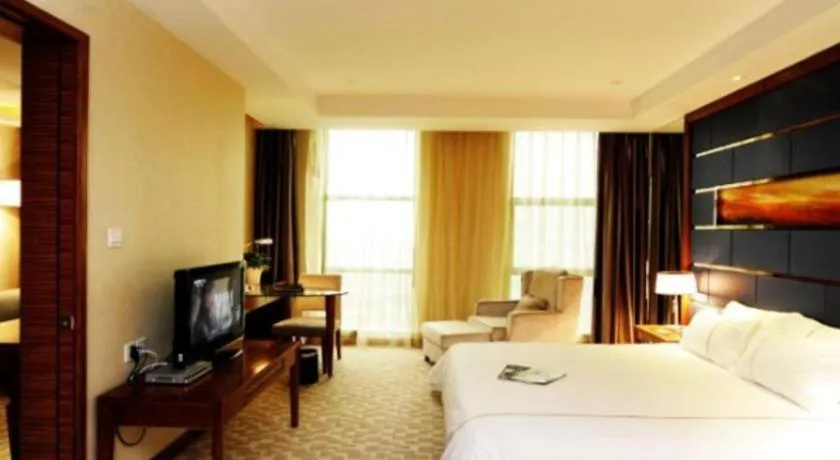 Bed in Ningbo East Shipu Hotel