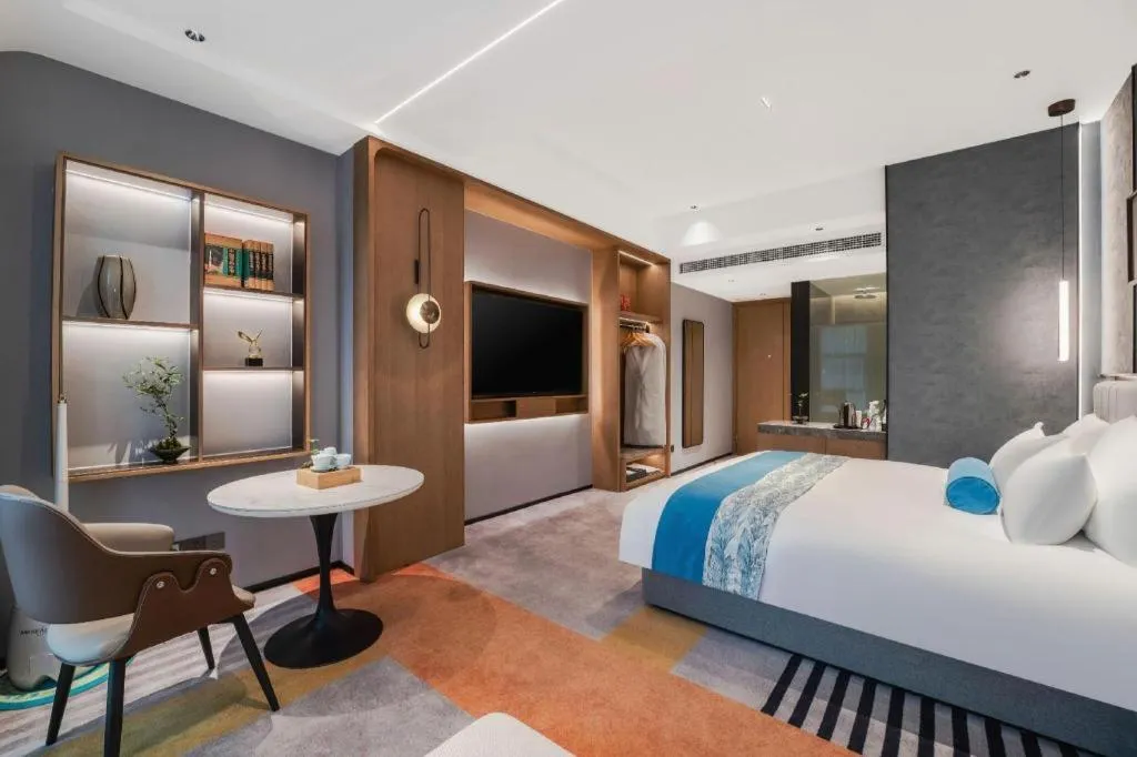 Bed in Ningbo East Shipu Hotel