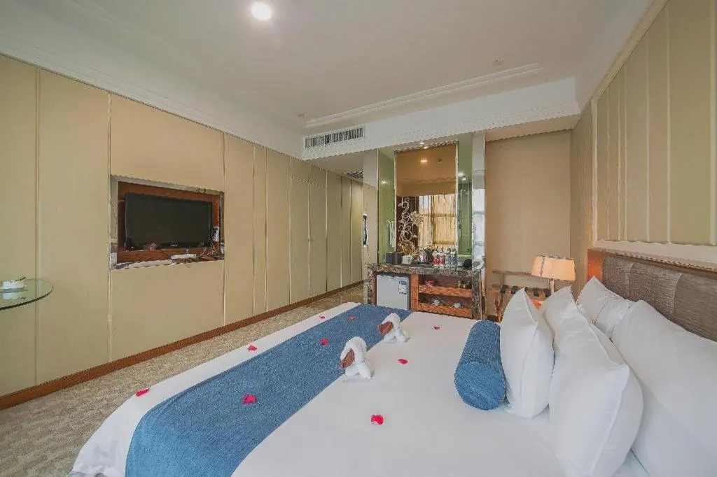 Bed in Ningbo East Shipu Hotel