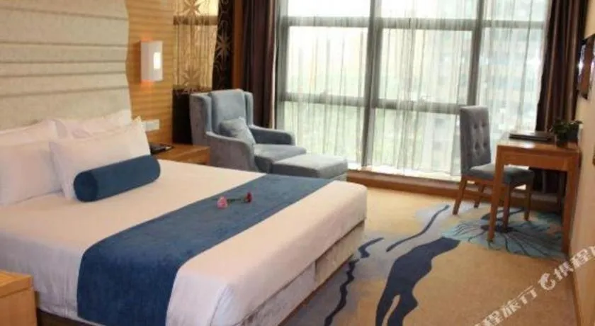 Bed in Ningbo East Shipu Hotel