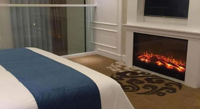 Bed in Ningbo East Shipu Hotel