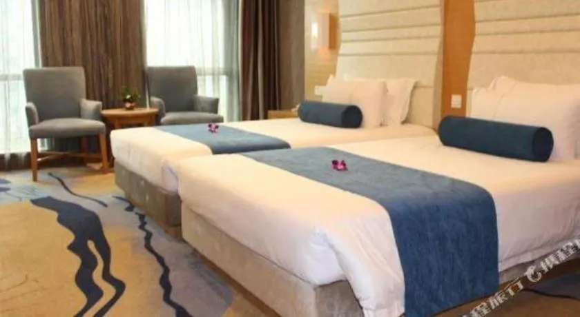 Bed in Ningbo East Shipu Hotel