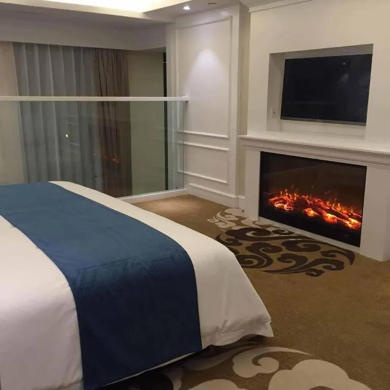 Bed in Ningbo East Shipu Hotel