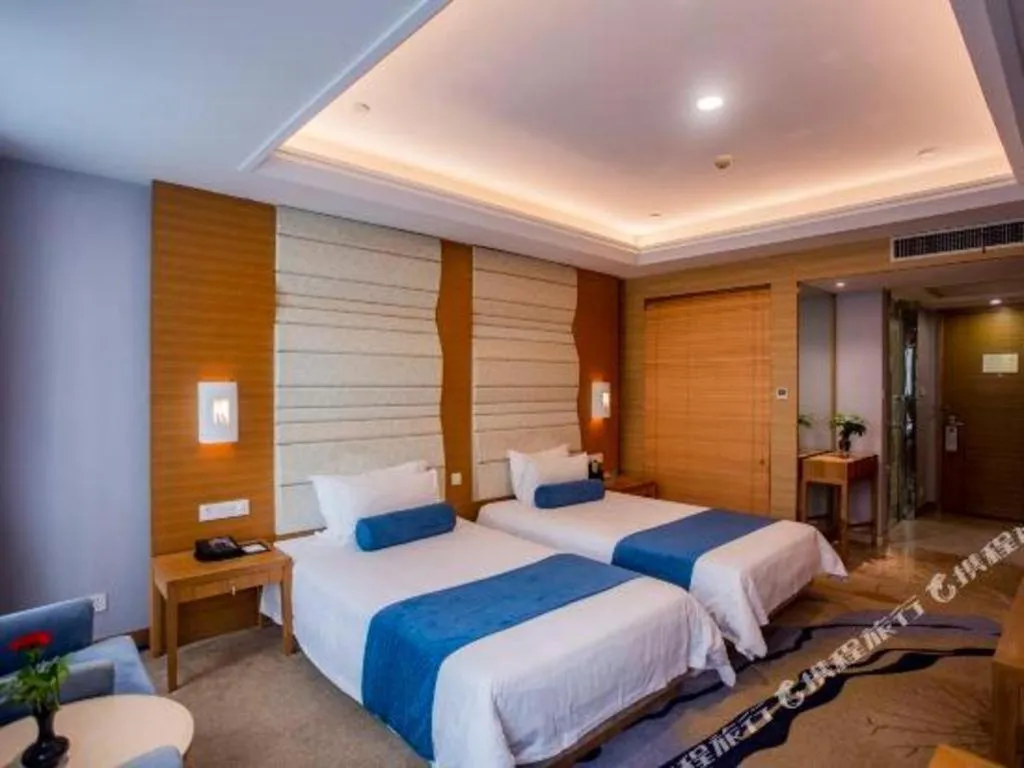 Bed in Ningbo East Shipu Hotel