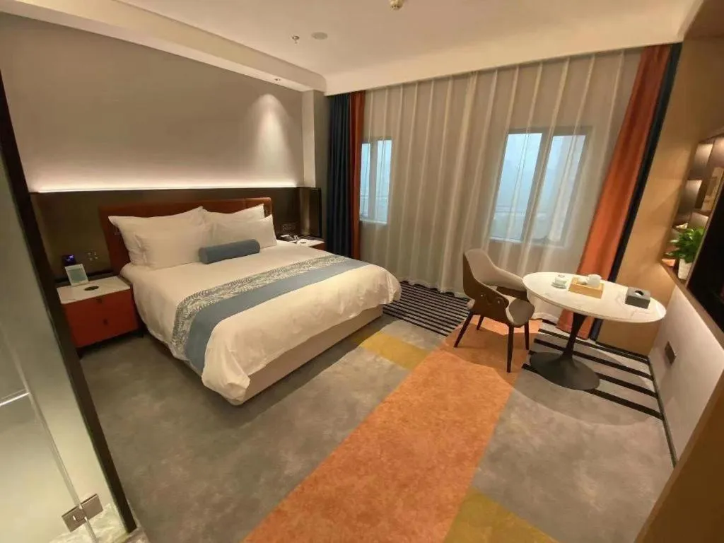 Bed in Ningbo East Shipu Hotel