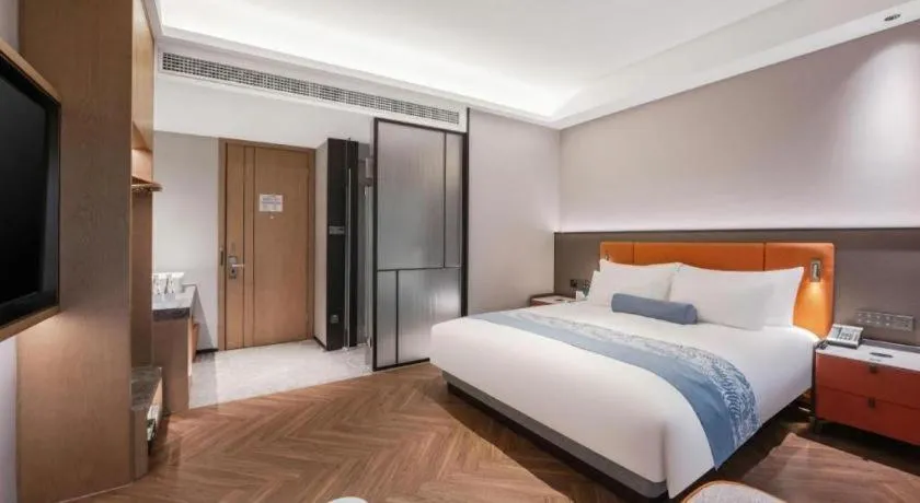 Bed in Ningbo East Shipu Hotel