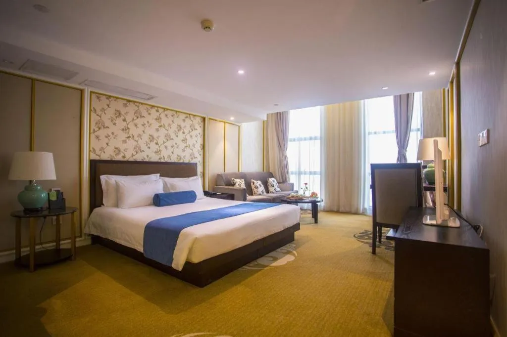 Bed in Ningbo East Shipu Hotel